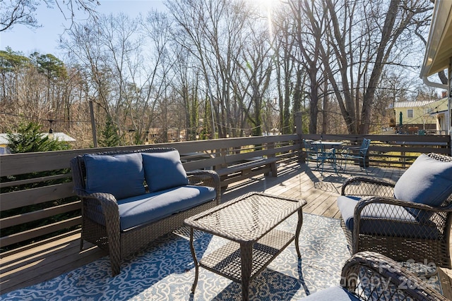 view of patio featuring outdoor lounge area and a deck