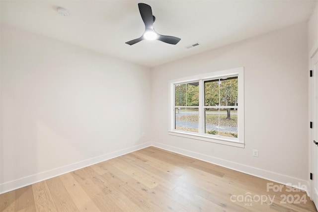 unfurnished room featuring wood-type flooring