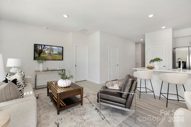 living room with light wood-type flooring