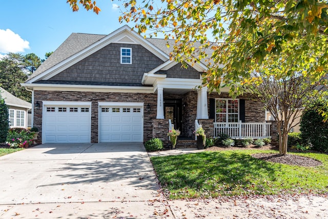 craftsman-style house with a garage and a porch