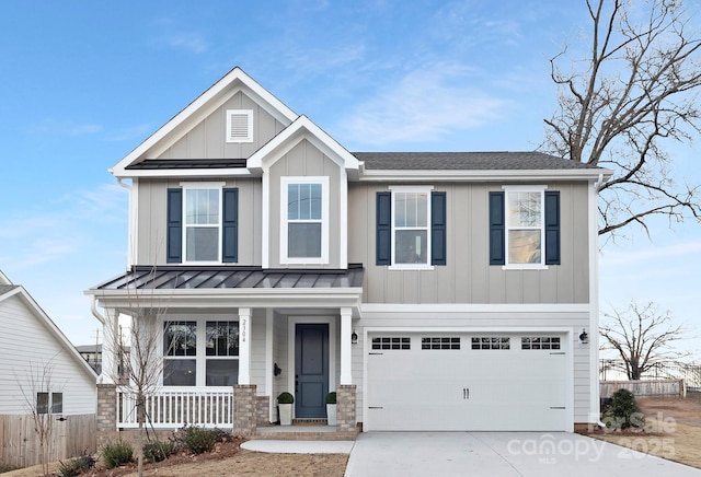 craftsman inspired home with a garage and covered porch