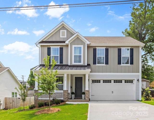 2304 Catalina Ave, Charlotte, NC 28206 - craftsman-style home featuring fence, a front lawn, concrete driveway, board and batten siding, and covered porch