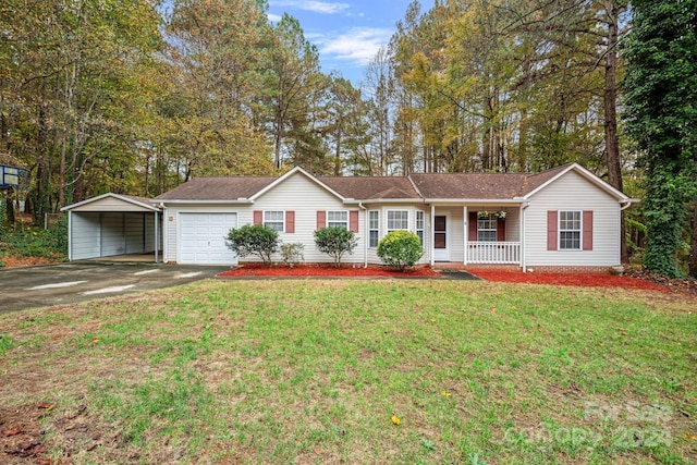 ranch-style house with a front lawn, a garage, covered porch, and a carport