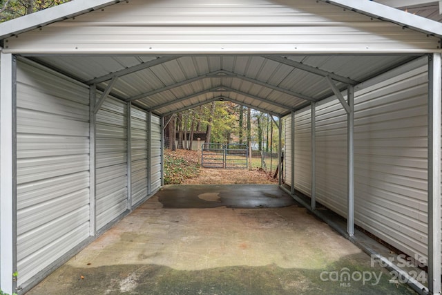 view of parking / parking lot featuring a carport