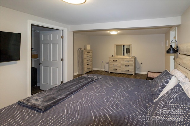 bedroom featuring dark hardwood / wood-style floors