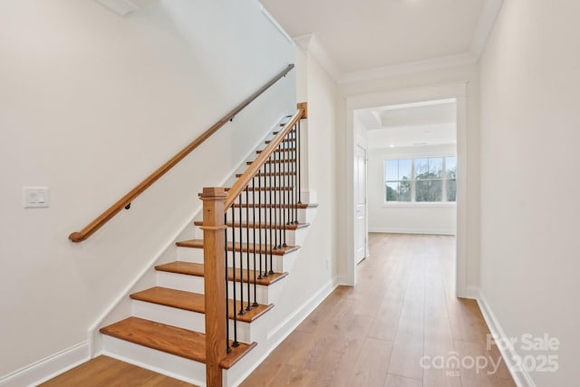 821 Terra Dr, Tega Cay, SC 29708 - stairway with crown molding, wood finished floors, and baseboards