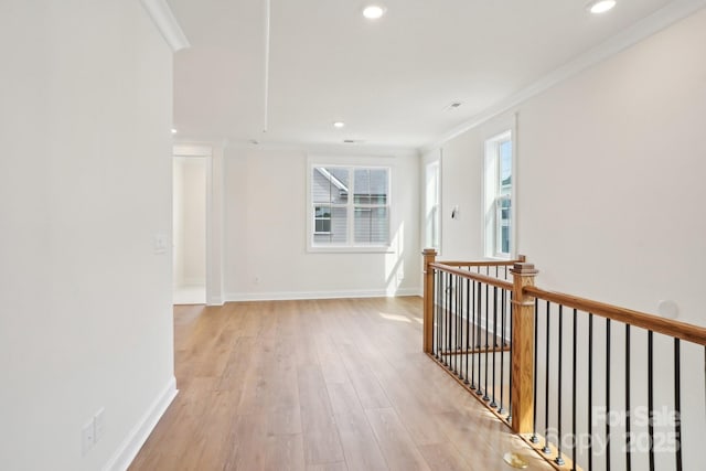 821 Terra Dr, Tega Cay, SC 29708 - corridor featuring an upstairs landing, light wood-style flooring, ornamental molding, recessed lighting, and baseboards
