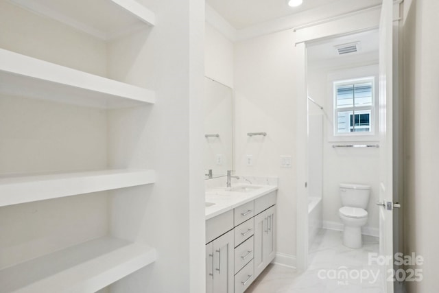 821 Terra Dr, Tega Cay, SC 29708 - bathroom featuring visible vents, toilet, double vanity, shower / bathtub combination, and a sink