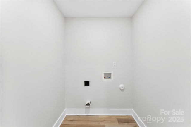 laundry room with washer hookup, electric dryer hookup, gas dryer hookup, and wood-type flooring