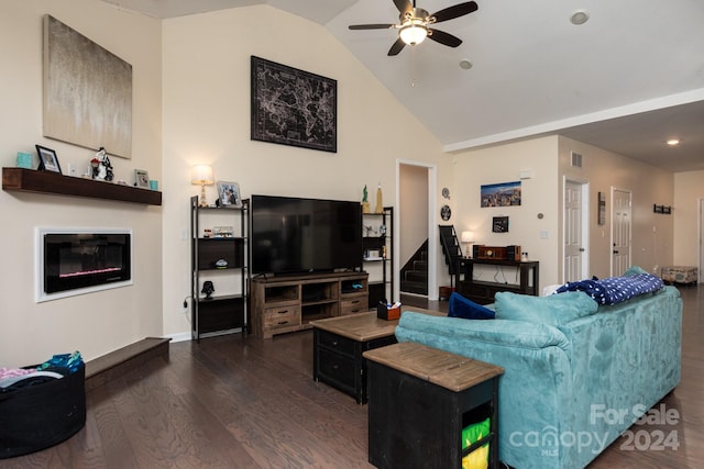 living room featuring lofted ceiling, ceiling fan, and dark hardwood / wood-style flooring