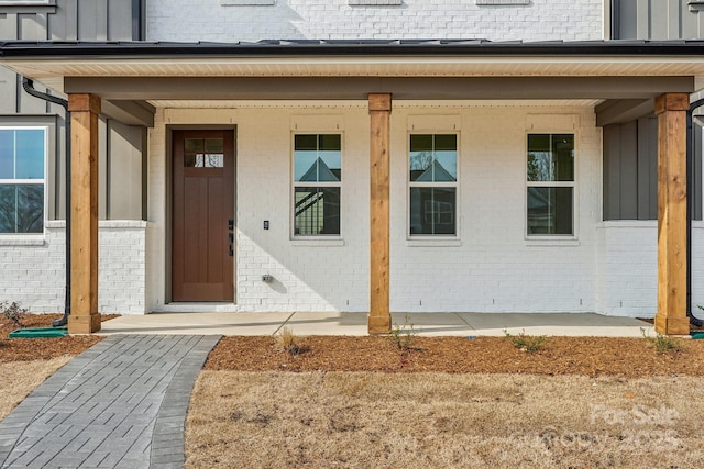 809 Terra Dr, Tega Cay, SC 29708 - entrance to property featuring brick siding and board and batten siding
