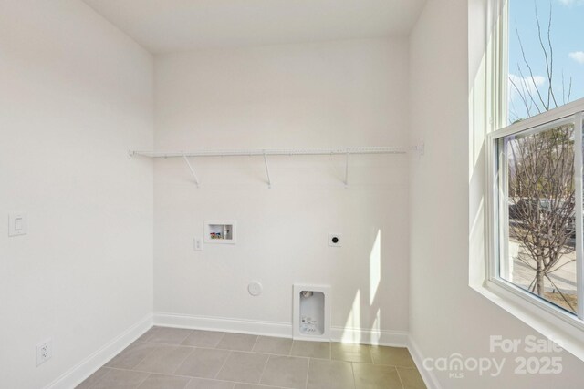 809 Terra Dr, Tega Cay, SC 29708 - washroom with electric dryer hookup, washer hookup, baseboards, gas dryer hookup, and laundry area