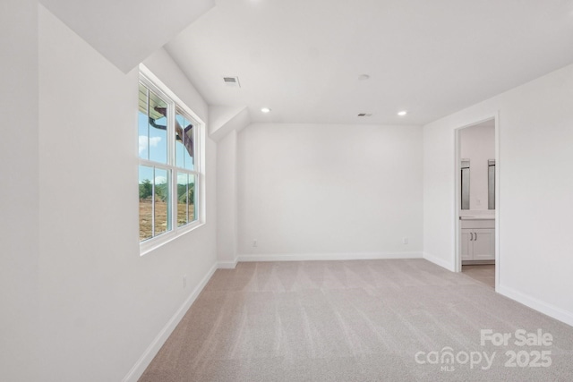 809 Terra Dr, Tega Cay, SC 29708 - spare room with recessed lighting, visible vents, baseboards, and light colored carpet