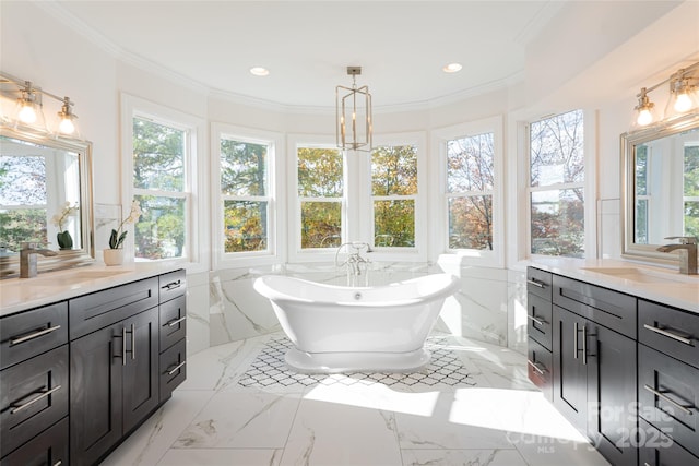 bathroom featuring a bathing tub, ornamental molding, tile walls, and vanity