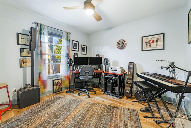 office space featuring hardwood / wood-style floors and ceiling fan