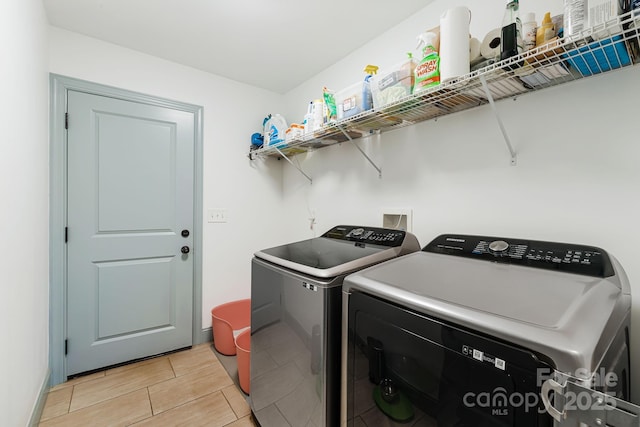 laundry room with washer and clothes dryer