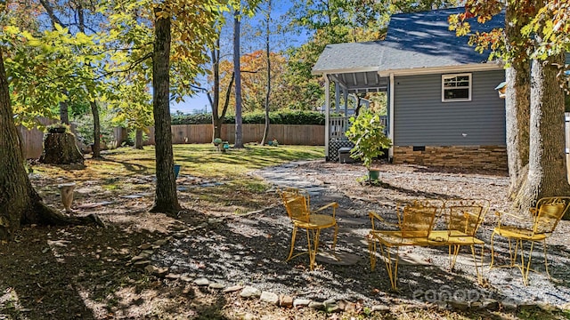 view of yard featuring a sunroom