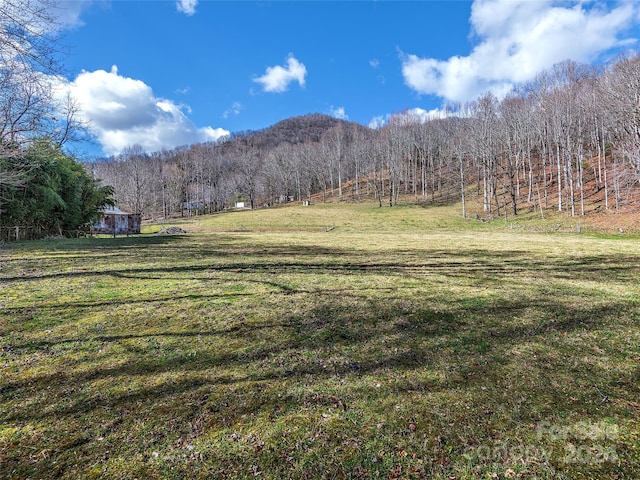 property view of mountains featuring a rural view