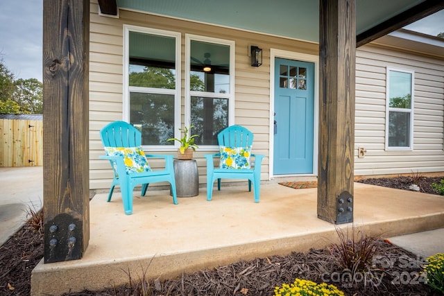 entrance to property featuring a patio area