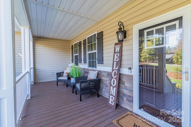 wooden terrace with covered porch