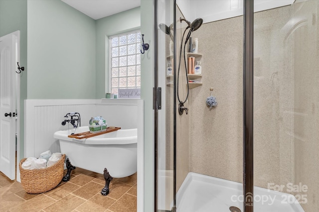 bathroom featuring shower with separate bathtub