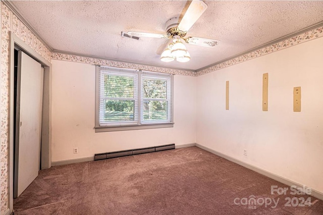 unfurnished bedroom with a textured ceiling, baseboard heating, and ceiling fan