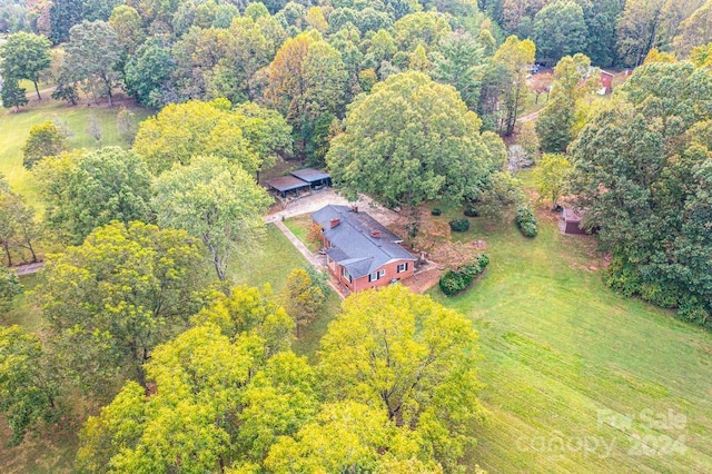 birds eye view of property with a rural view