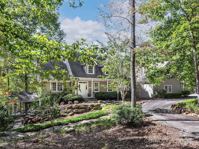 view of new england style home