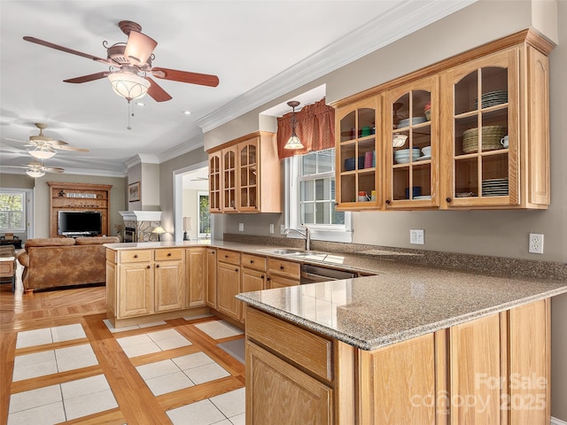 kitchen with light brown cabinets, a peninsula, glass insert cabinets, dishwasher, and crown molding