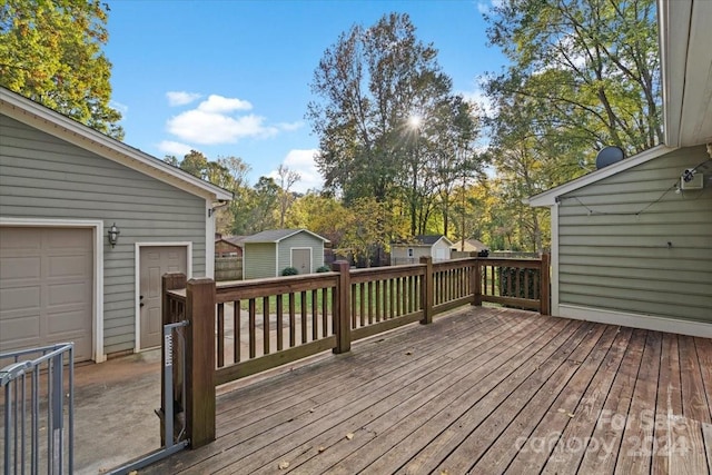 wooden terrace featuring a storage shed