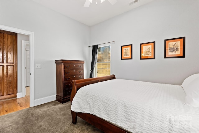 bedroom with ceiling fan and carpet