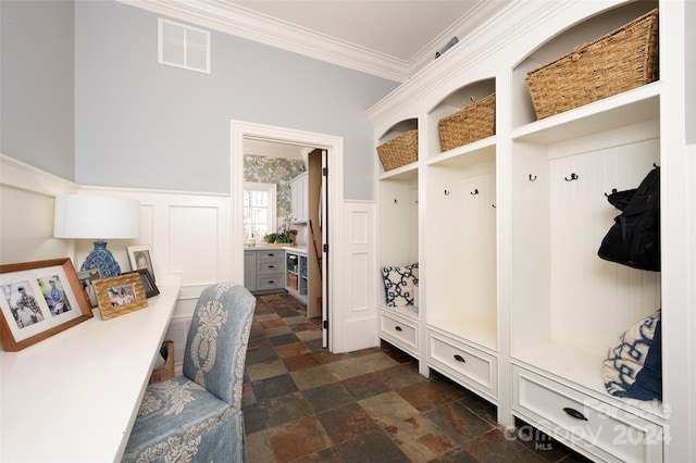 mudroom featuring ornamental molding