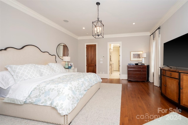 bedroom with dark wood-type flooring, crown molding, and a notable chandelier