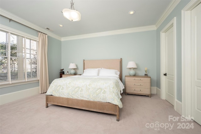 bedroom featuring light colored carpet and crown molding