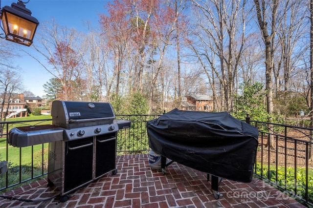 view of patio featuring a grill