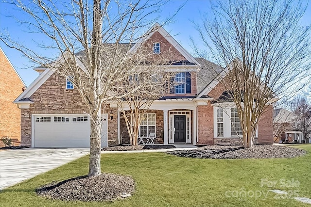 view of front property with a garage and a front lawn