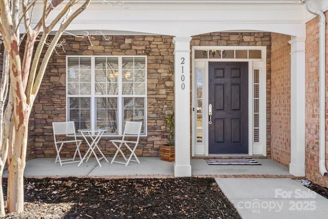 entrance to property with covered porch