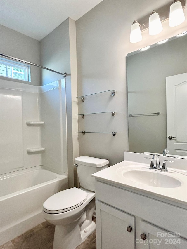 full bathroom featuring vanity, toilet, and shower / washtub combination