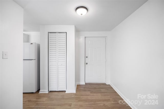 hall featuring light hardwood / wood-style floors