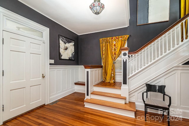 entryway with wood-type flooring