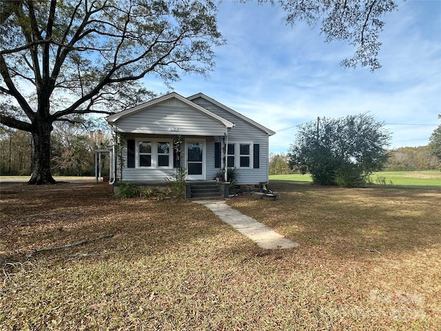 view of front of house with a front lawn