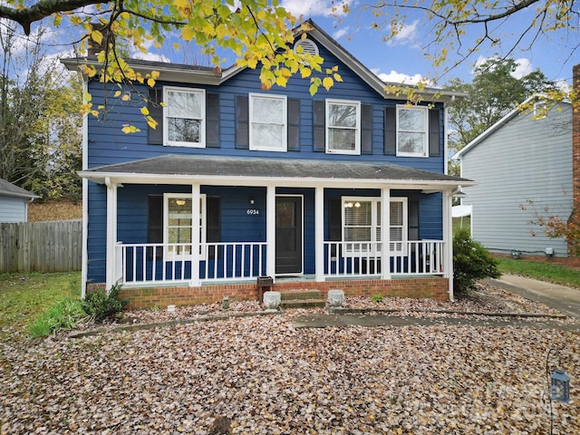 view of front of property featuring covered porch