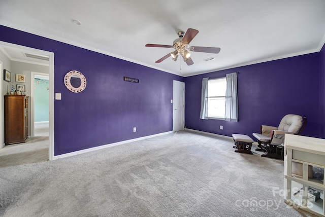 unfurnished room with ceiling fan, ornamental molding, and light carpet