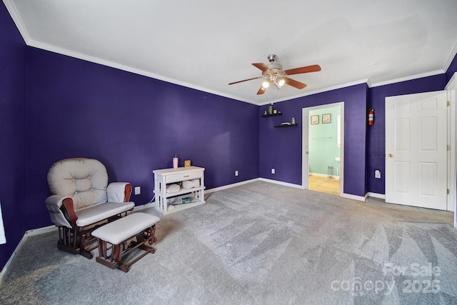 unfurnished room with ceiling fan, ornamental molding, and carpet floors