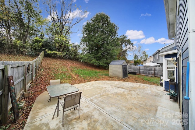 view of patio / terrace with a storage unit