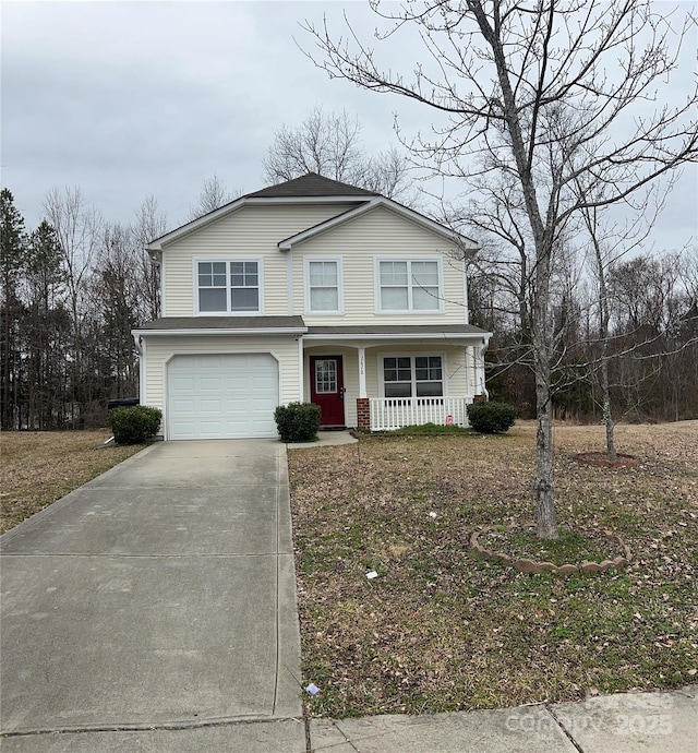 view of front facade featuring a garage and a porch