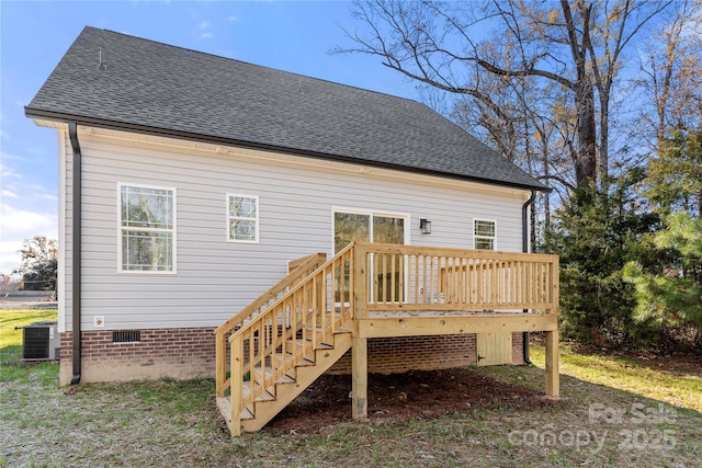 back of property featuring a deck, a shingled roof, crawl space, and stairway