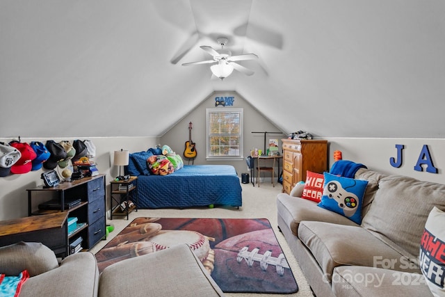 carpeted bedroom with ceiling fan and vaulted ceiling