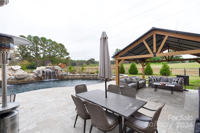 view of patio featuring a gazebo, pool water feature, and outdoor lounge area