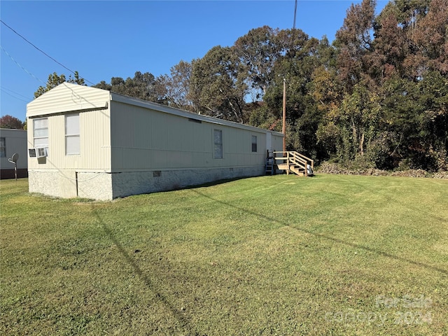 view of property exterior featuring a lawn